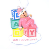 BABY GIRL ATOP LETTER BLOCKS ORNAMENT