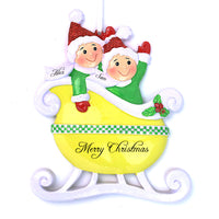 YELLOW TAXI SLEIGH COUPLE ORNAMENT