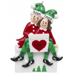 Image of Elf Sitting on Gift Box Couple